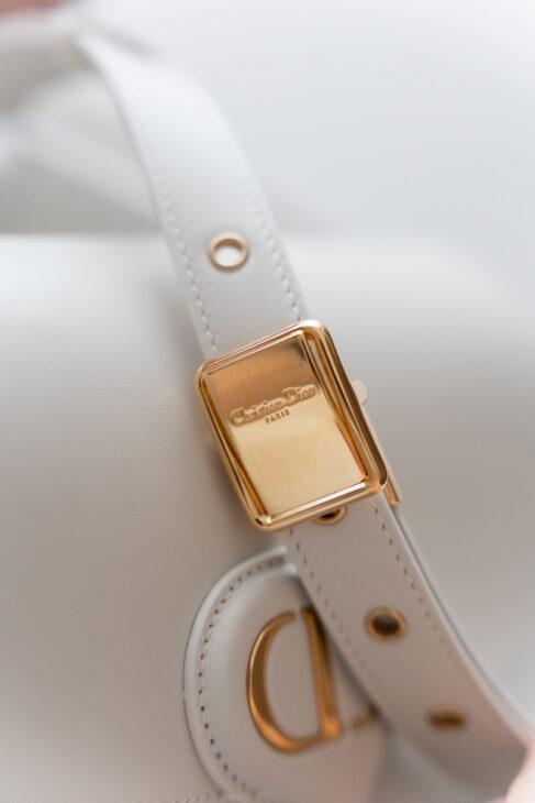 Gold buckle with Christian Dior logo