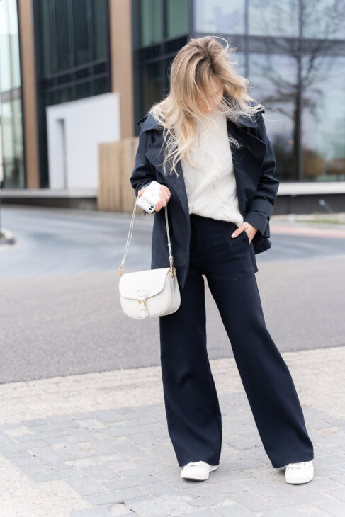Navy-blue trench coat matched with trousers